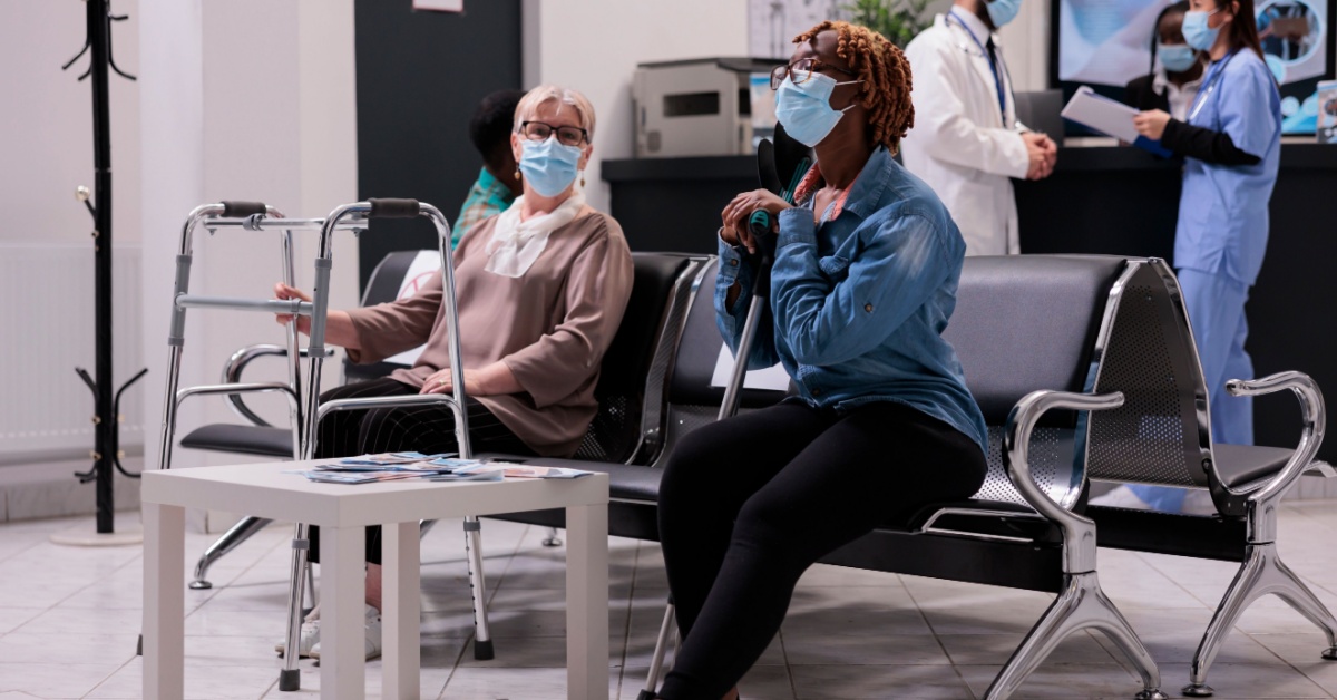 two women sitting in hospital waiting room