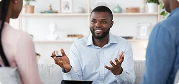 smiling counselor representing the online MSW advanced standing program at Cleveland State University