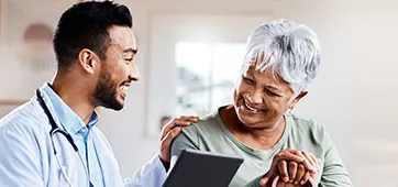 nurse with patient representing the online nursing programs at CSU online