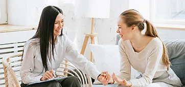 nurse with patient representing the online nursing programs at CSU online